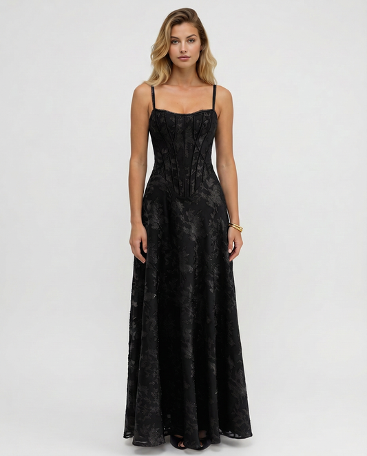 Black maxi corset-style dress with thin straps, sweetheart neckline, flared skirt