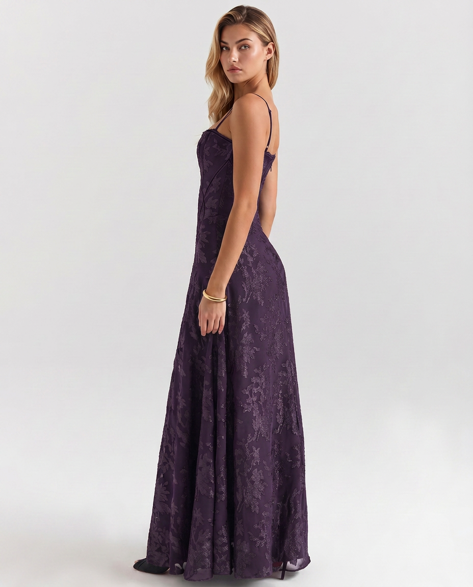 Purple maxi corset-style dress with thin straps and textured jacquard fabric, flared skirt
