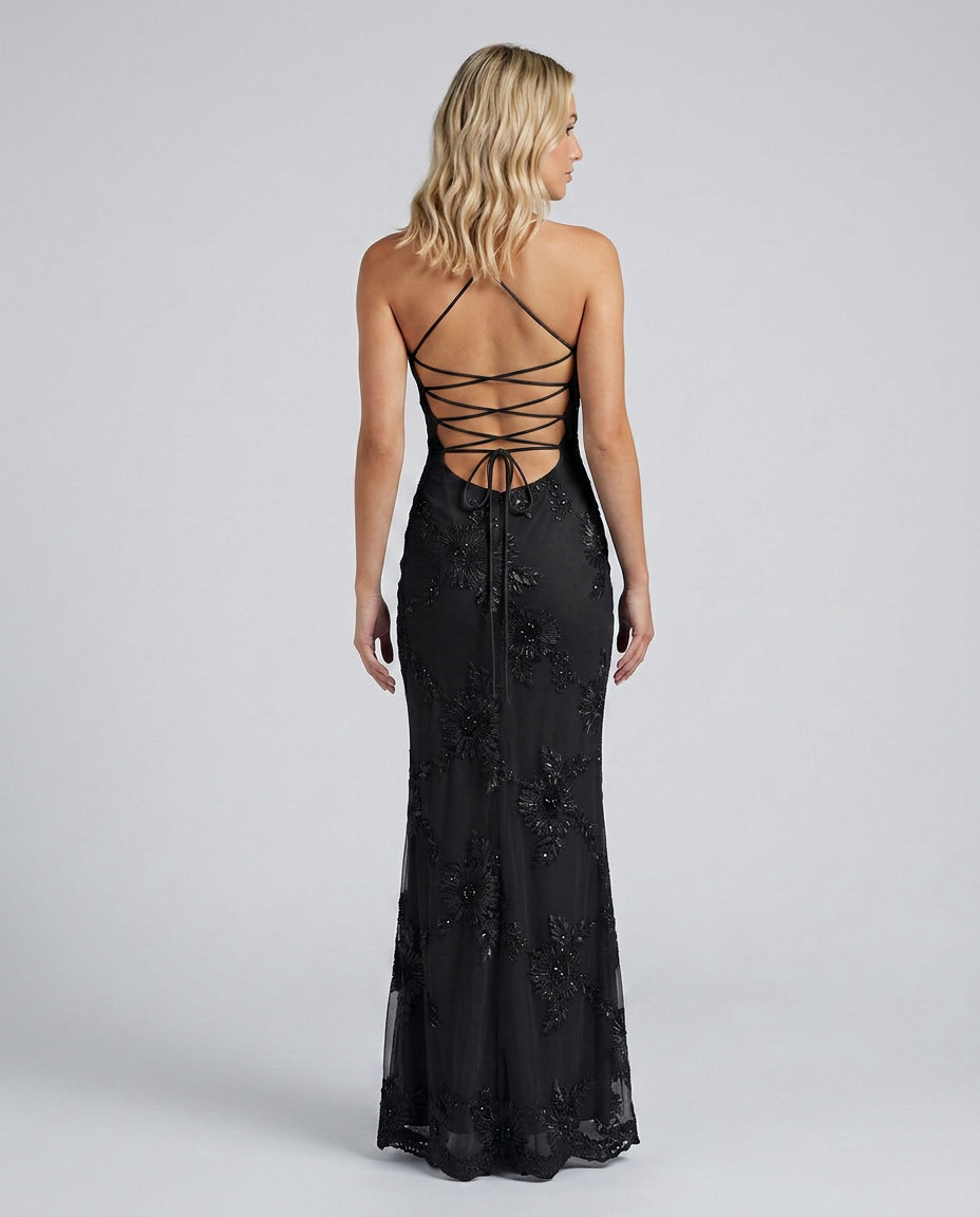 Black fitted maxi dress back view with crisscross lace-up straps