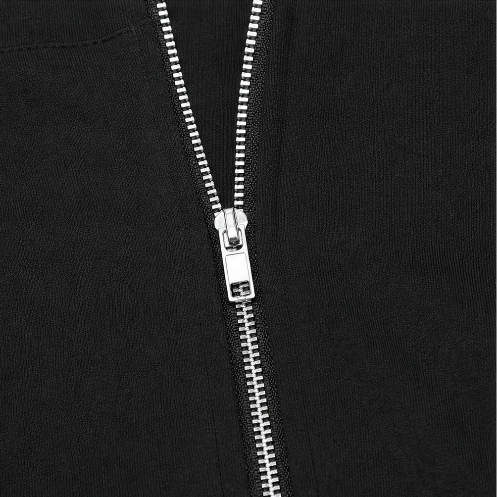 Black cardigan full-zip front with silver zipper pull and teeth