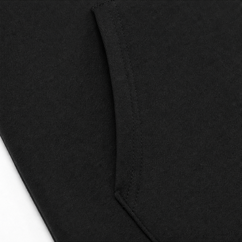 Black knit cardigan side seam detail with stitched edge
