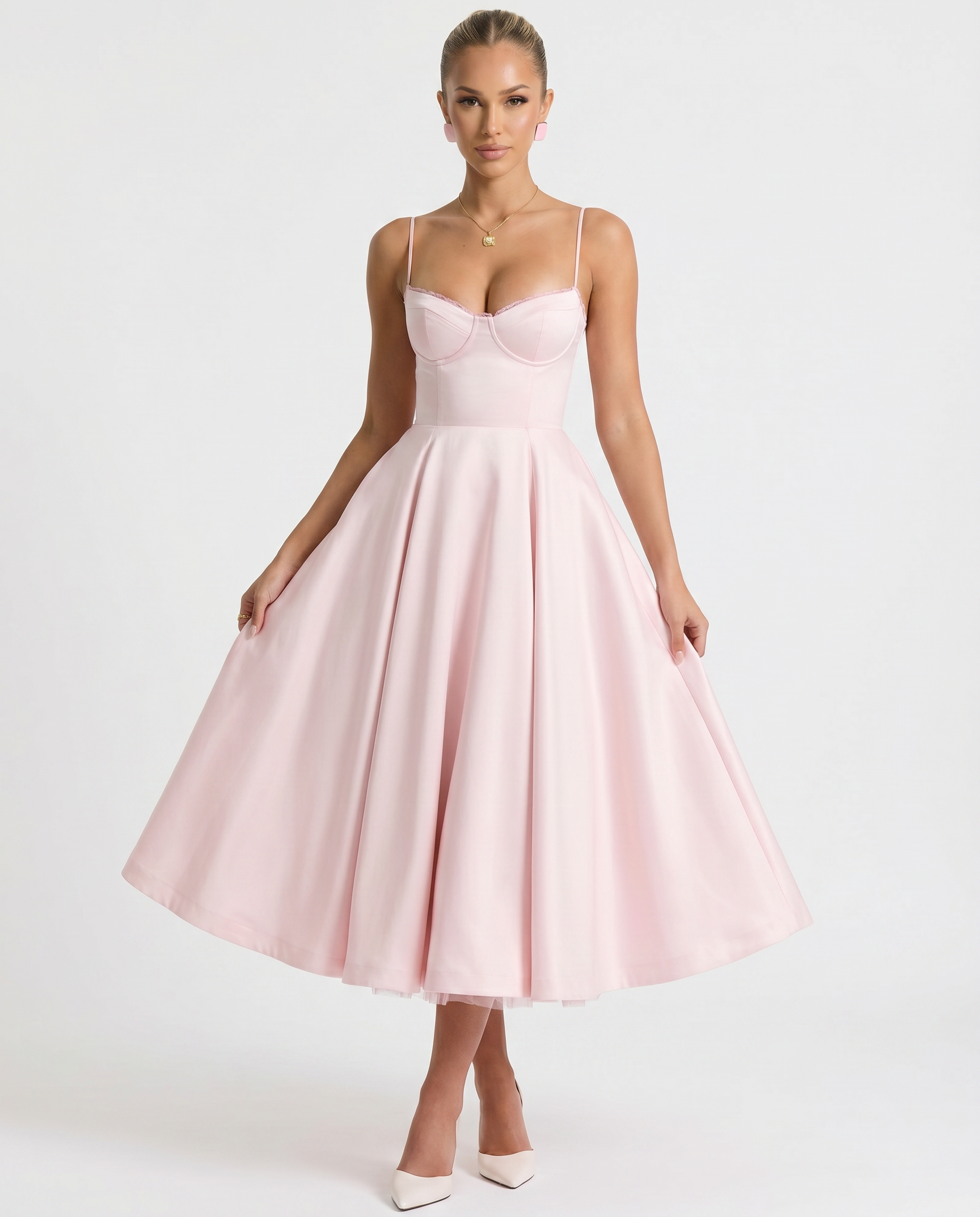 Pink tulle midi dress with underwired bust, spaghetti straps, full skirt.