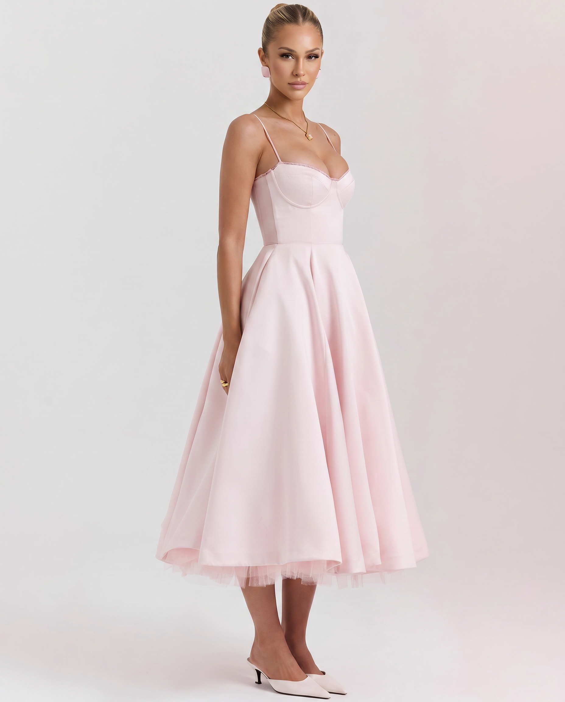 Pink tulle midi dress with underwired bodice and spaghetti straps.