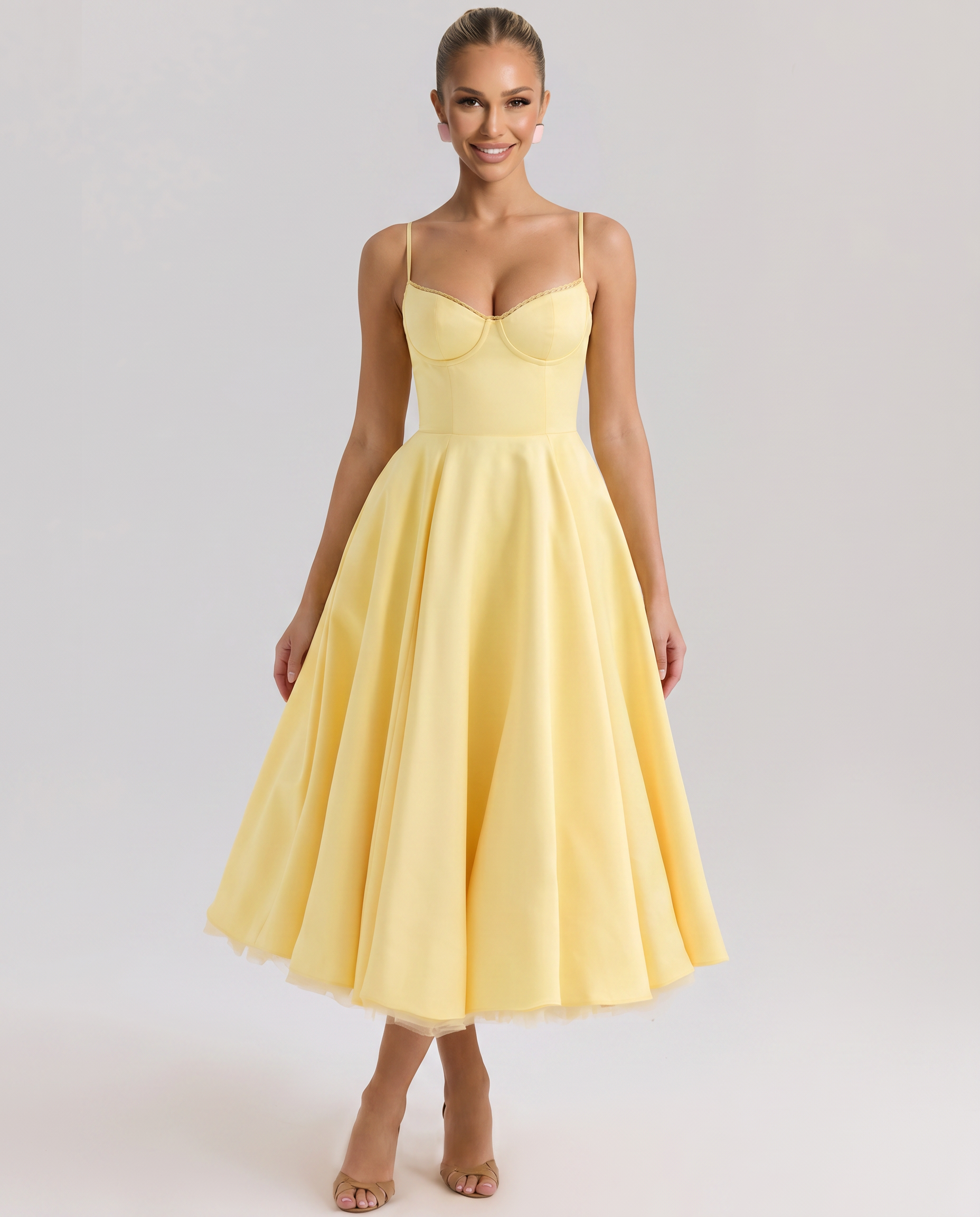 Yellow tulle midi dress with underwired bust, spaghetti straps, full skirt.