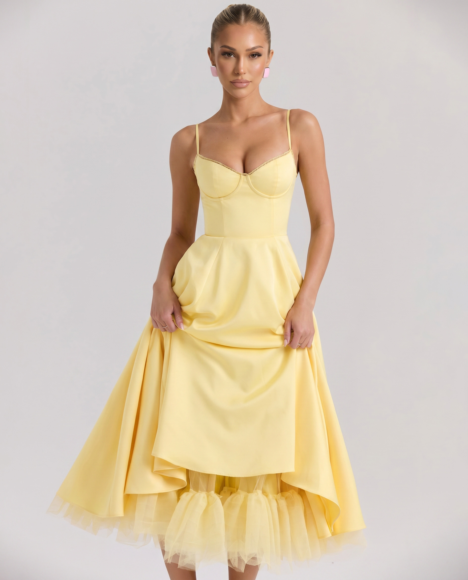Yellow tulle midi dress with underwired bodice, spaghetti straps, tiered hem.