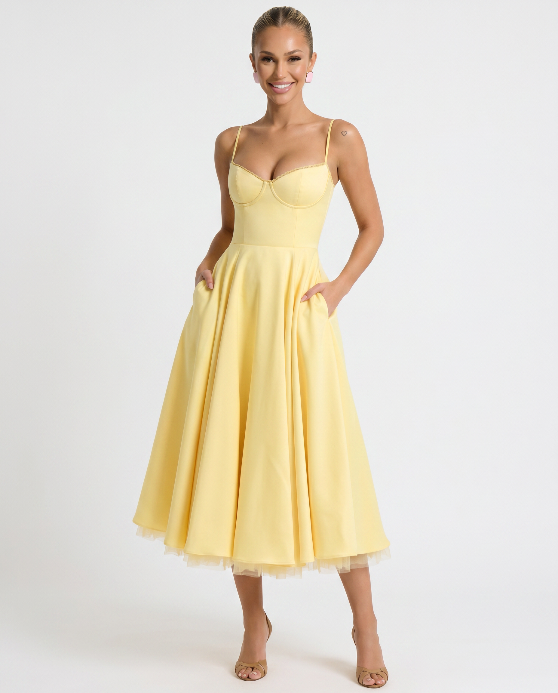 Yellow tulle midi dress with underwired bust, spaghetti straps, flared midi skirt.