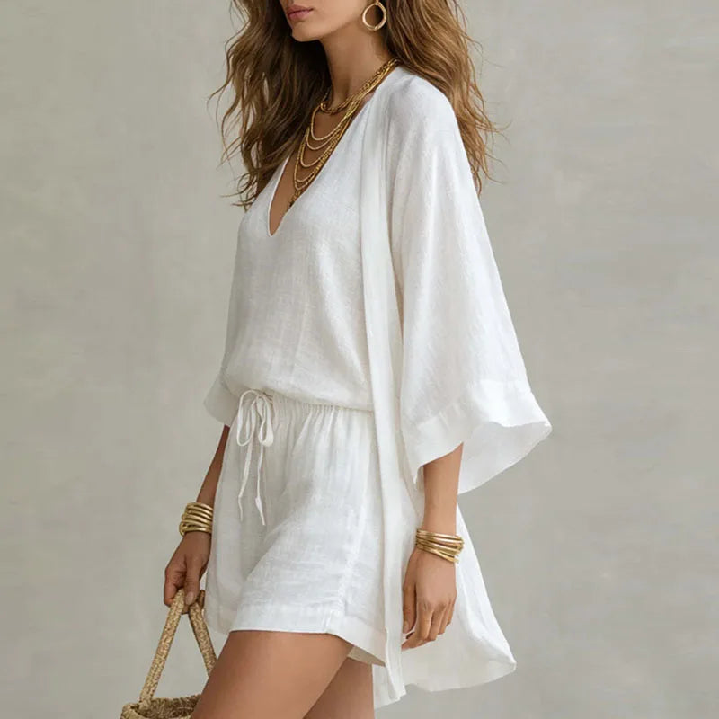 White open-front cardigan over V-neck top with drawstring waist shorts