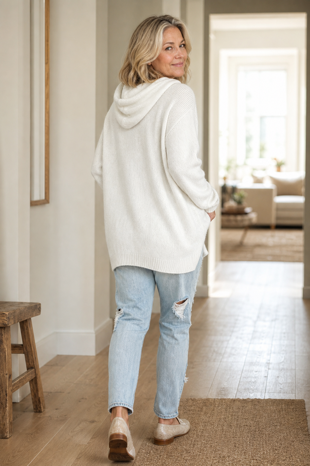 White oversized knit hooded sweater with ribbed cuffs and relaxed back