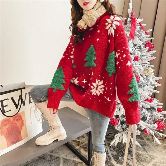 Red oversized holiday sweater with green Christmas trees and snowflake motifs, long sleeves