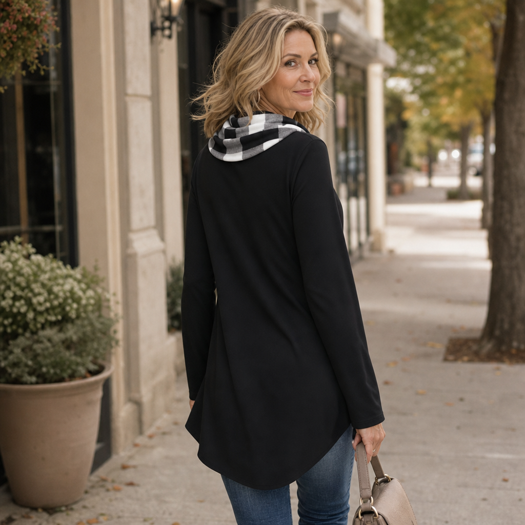 Black long-sleeve tunic with plaid cowl neckline and asymmetrical hem