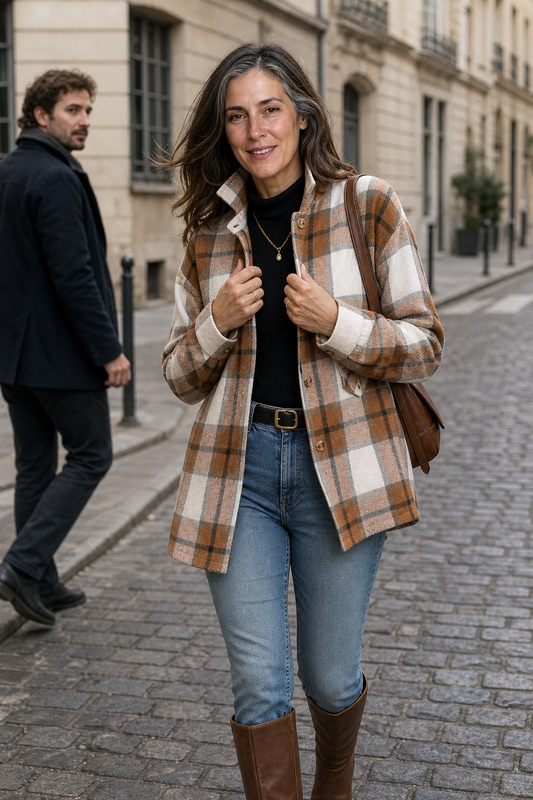 Brown plaid shirt jacket with button front, collar, chest pockets and long sleeves.