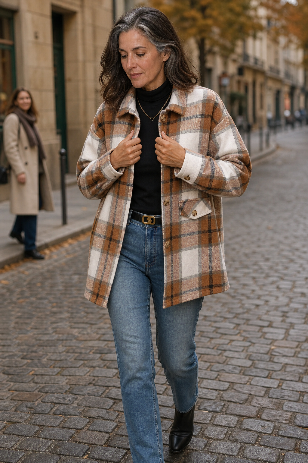 Brown plaid shirt jacket with button front, collar, chest pockets, long sleeves.