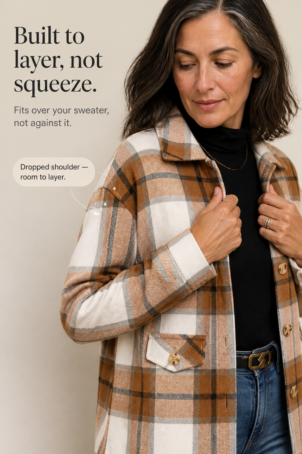 Plaid shirt jacket close-up: buttoned chest pocket and front placket, long sleeve.