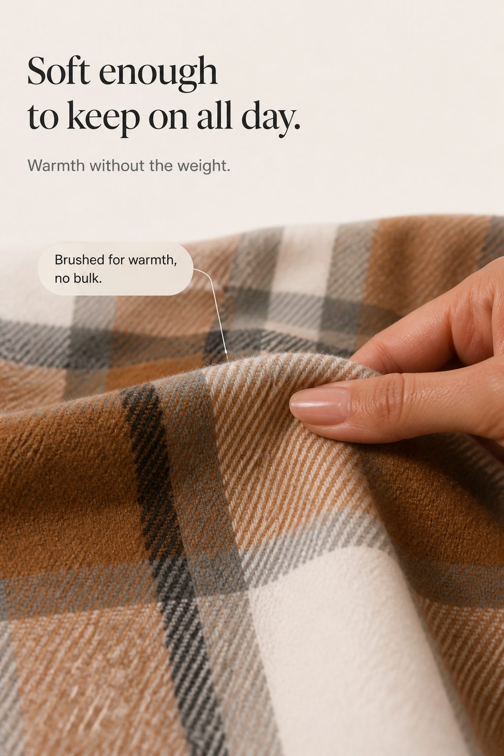 Brown plaid flannel fabric swatch with brushed texture and white stripes.
