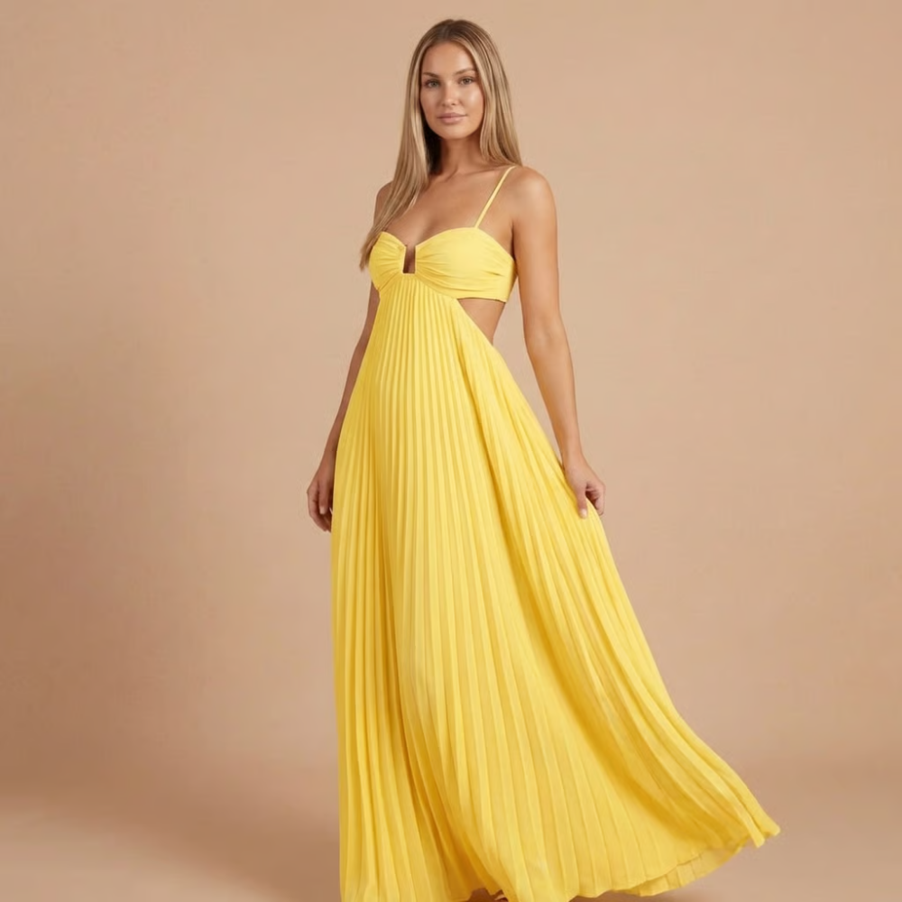 Yellow pleated halter maxi dress with sweetheart bodice and waist cutouts