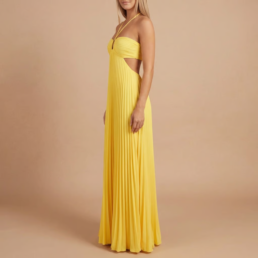 Yellow pleated halter maxi dress with side waist cutout and fitted halter bodice