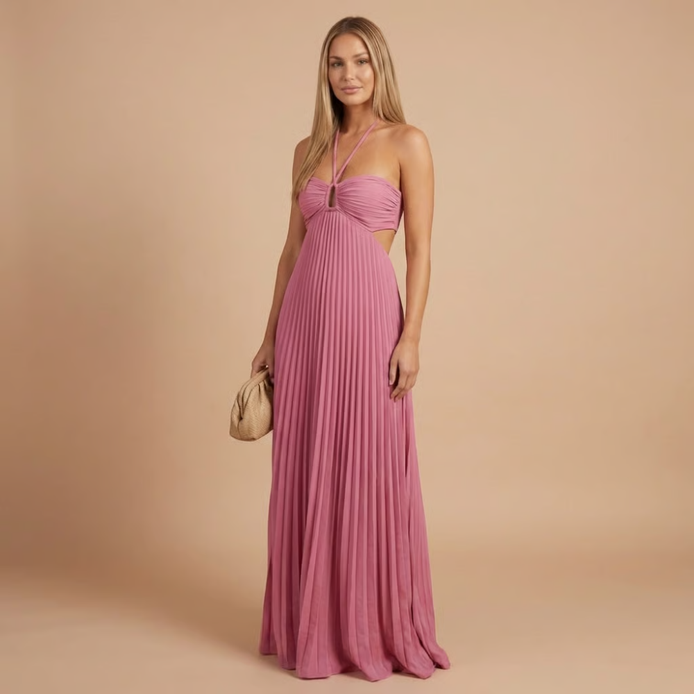 Pink pleated halter maxi dress with ring detail at bust and waist cutouts