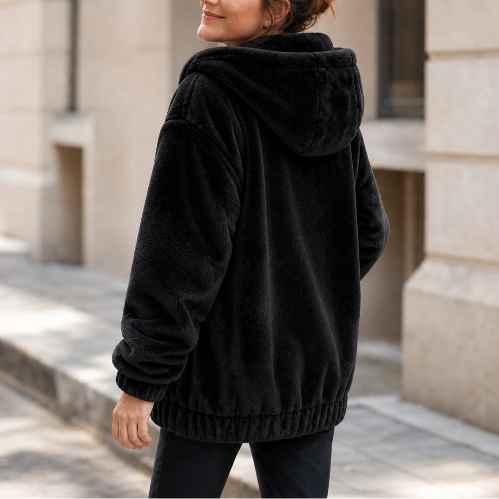 Black plush-lined hooded vest with front kangaroo pocket and thick fleece look
