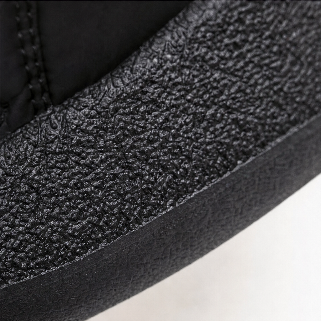 Black plush-lined ankle boot upper with textured finish and side zipper track