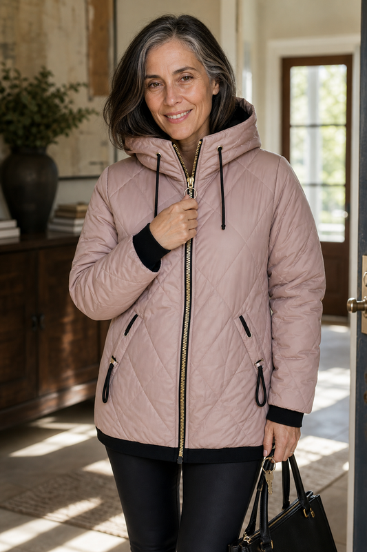Pink quilted hooded zip-front jacket, gold zipper center, black drawstrings