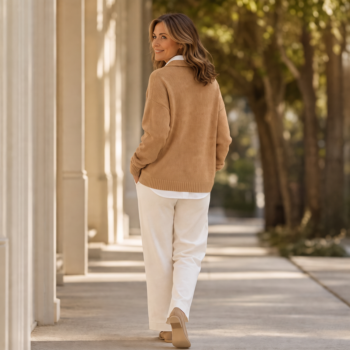 Khaki knit sweater with polo collar, ribbed cuffs, and side button detail