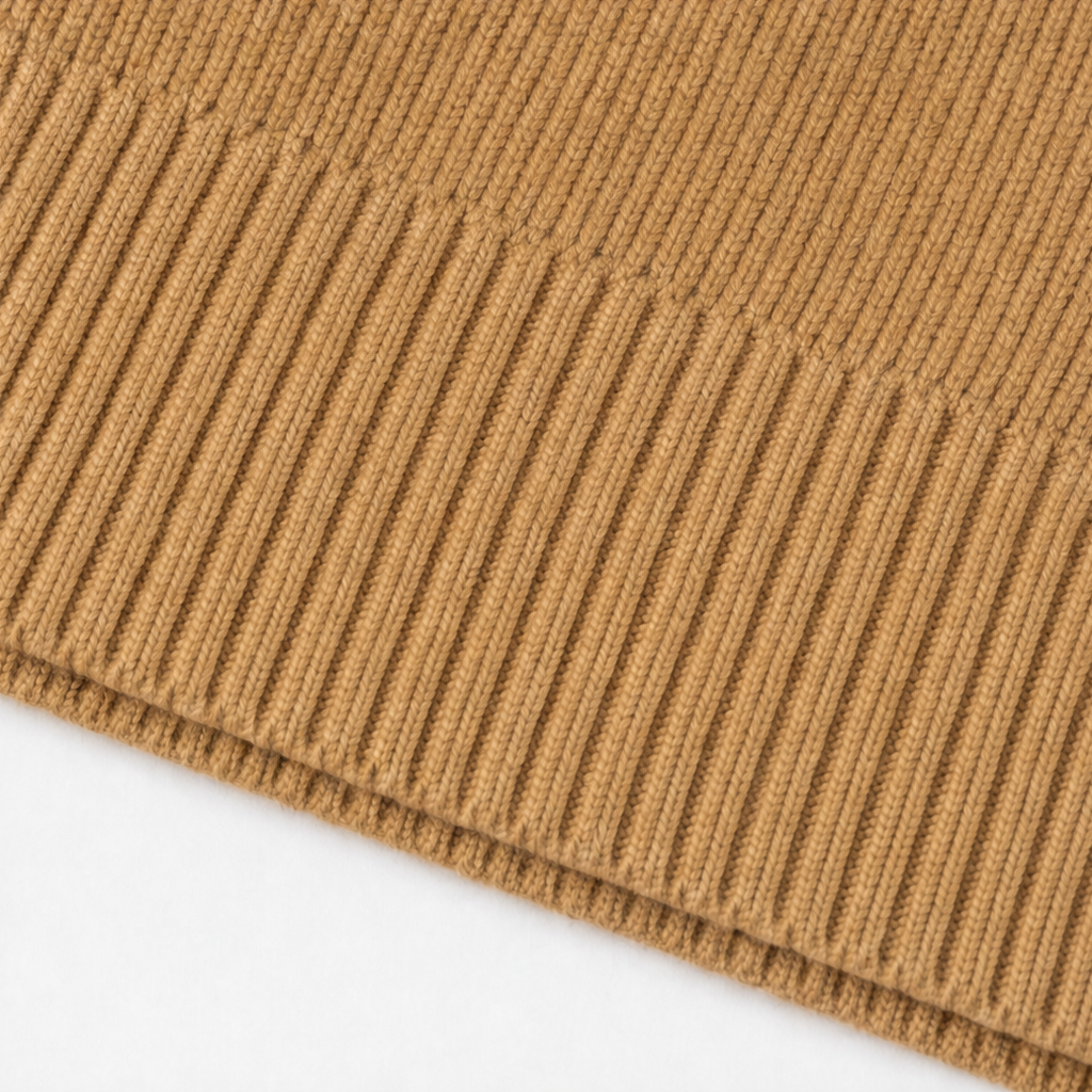 Khaki ribbed knit sweater hem close-up