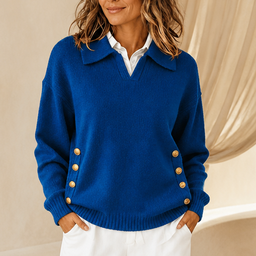 Blue relaxed knit polo sweater with white collar and gold side buttons.