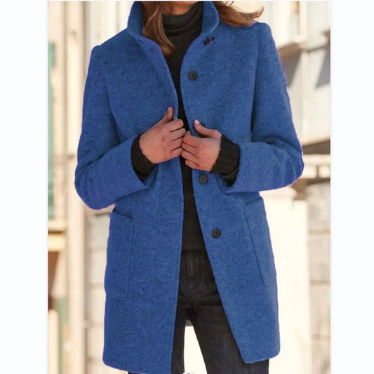 Bright blue wool stand-collar coat with dark button placket and pockets