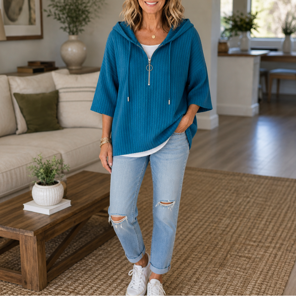 Teal ribbed half-zip hooded knit top with short sleeves and front zipper