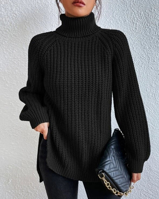 Black ribbed turtleneck sweater with long sleeves and chunky knit body.