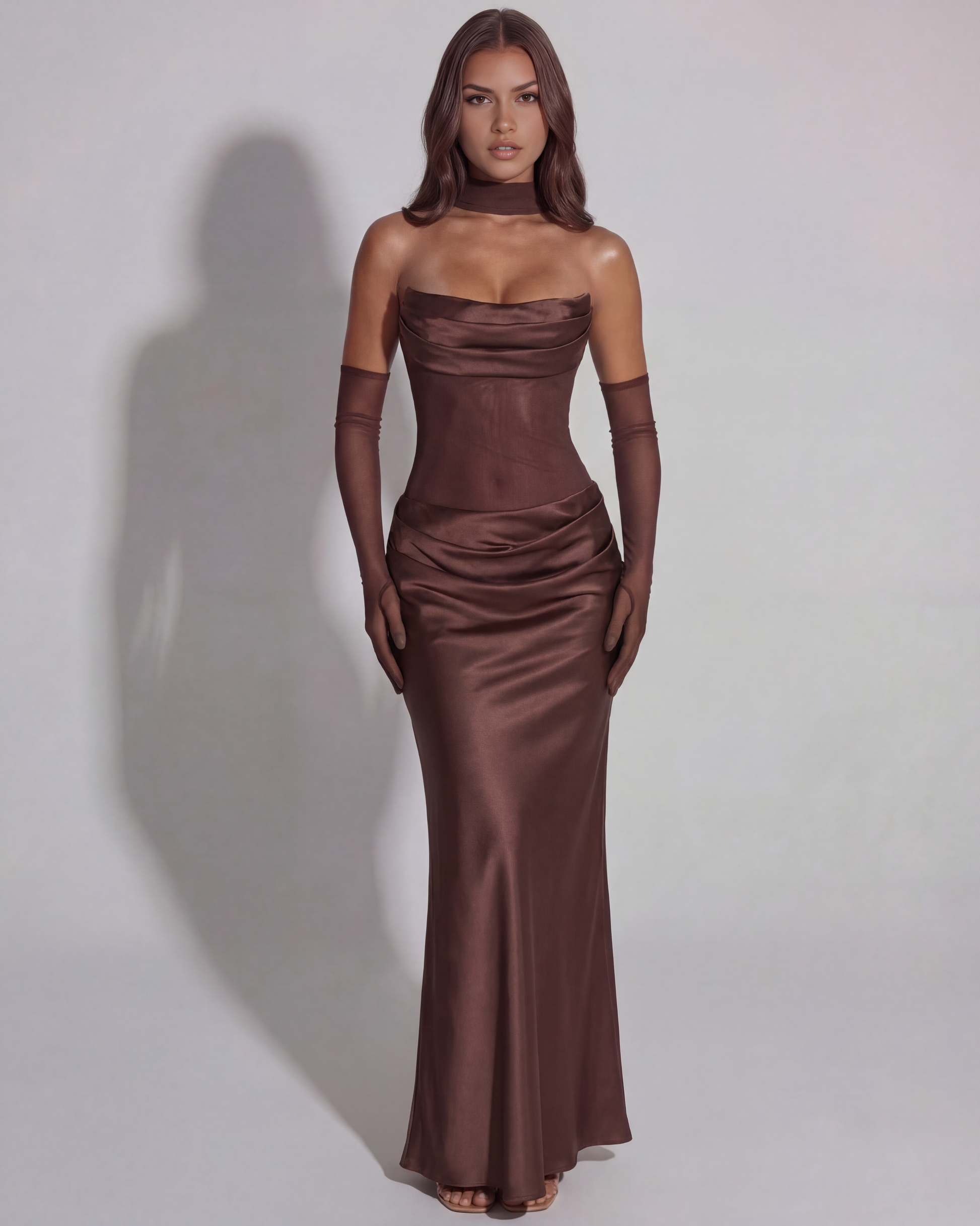 Brown satin cowl neck maxi dress with fitted ruched waist and long skirt