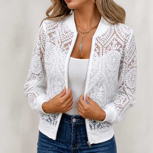 Sheer white lace bomber jacket with zip front and ribbed hem, worn over a white tank top.