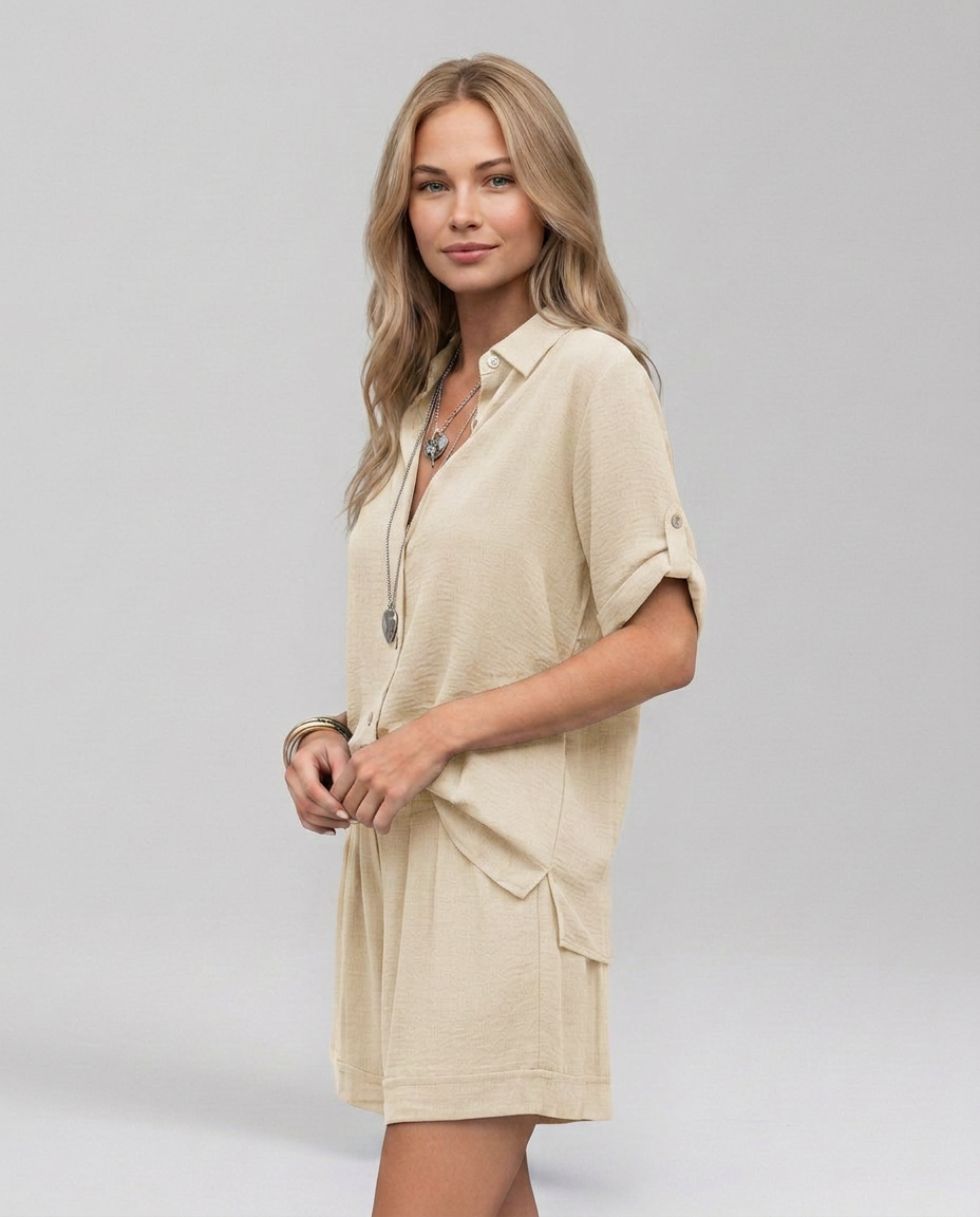Beige short-sleeve collared top and matching shorts set, button front