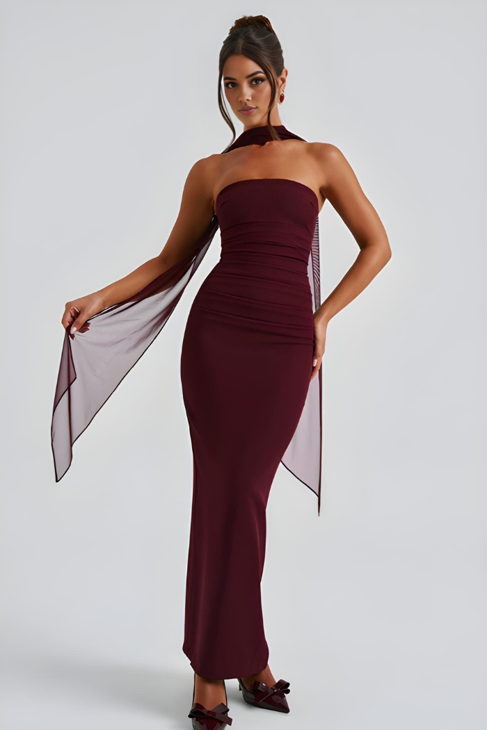 Burgundy strapless bodycon maxi dress with ruched fit and draped side scarf