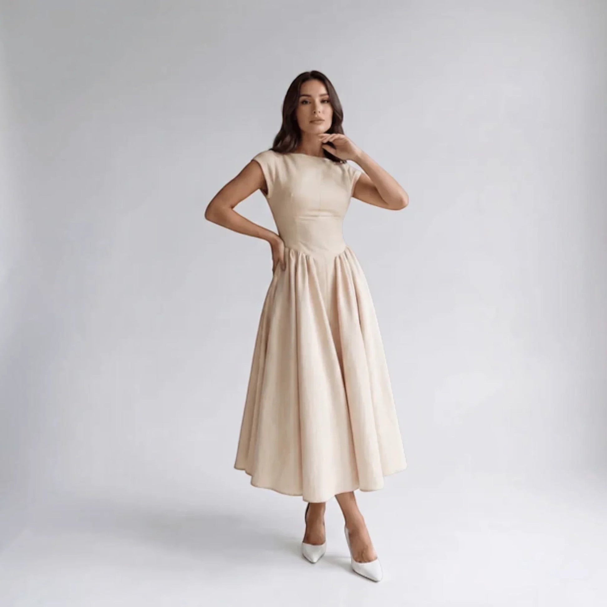 Beige sleeveless fit-and-flare midi dress with scoop neckline and pleated skirt