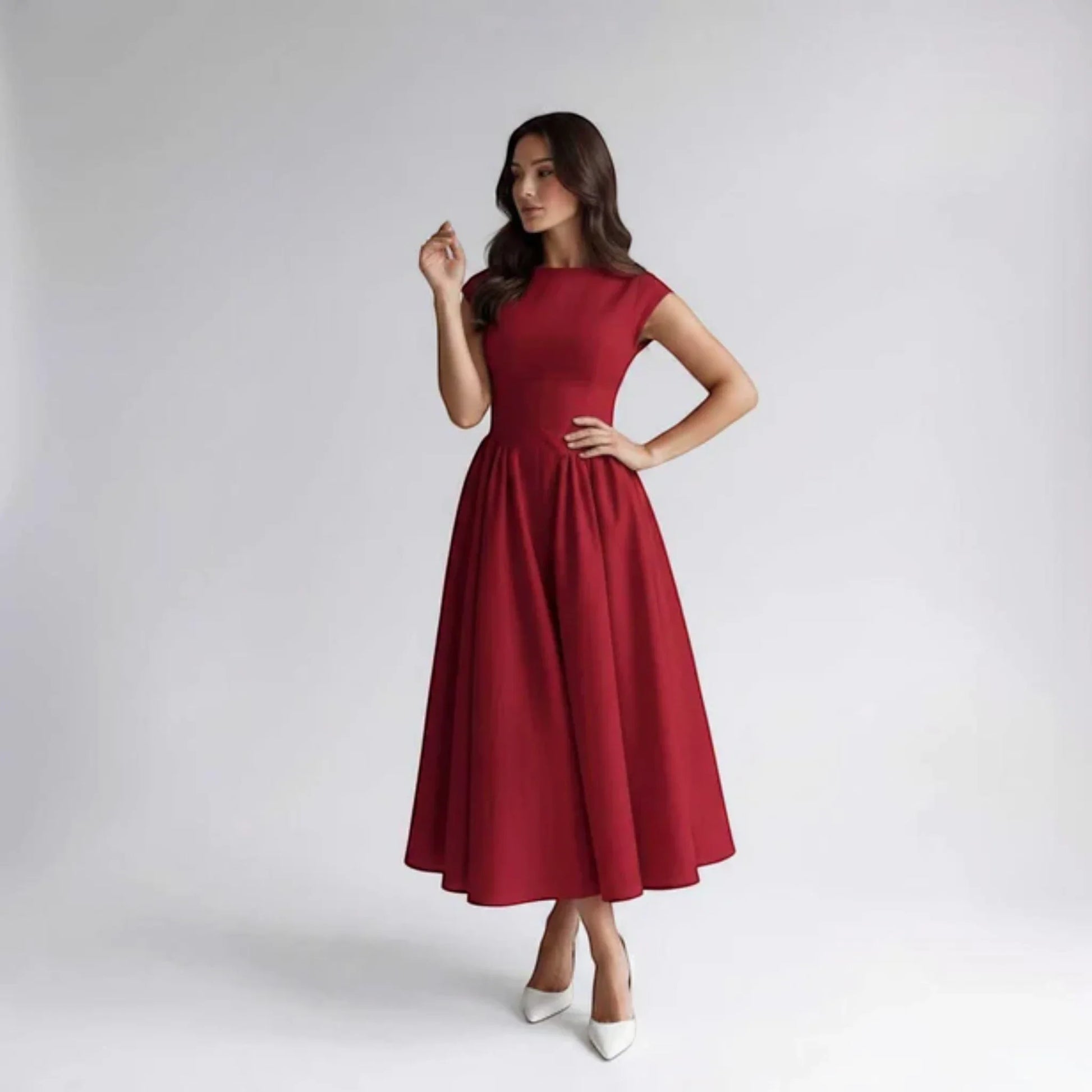 Red sleeveless fit-and-flare midi dress, front view with scoop neckline and gathers