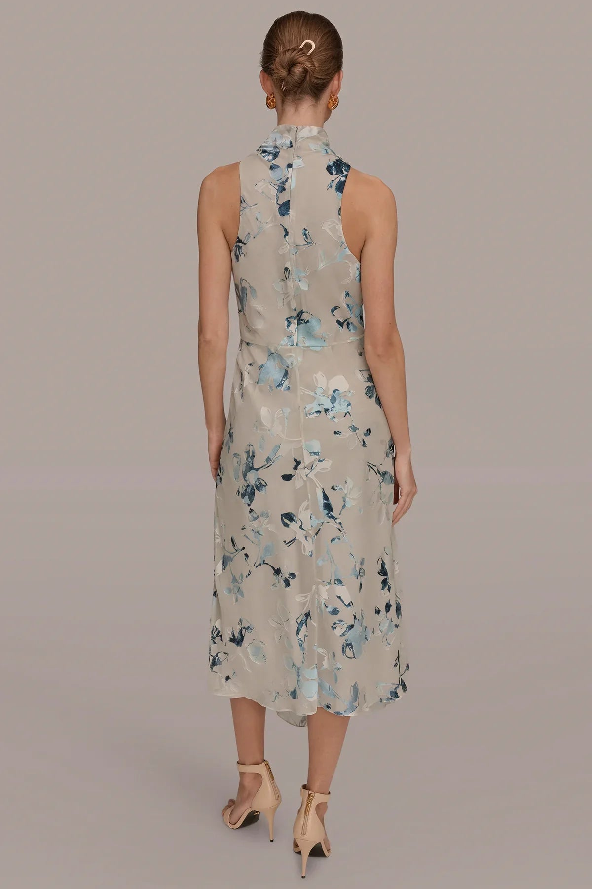 Back view of sleeveless Sea Mist multi midi dress with blue floral burnout, high neckline.