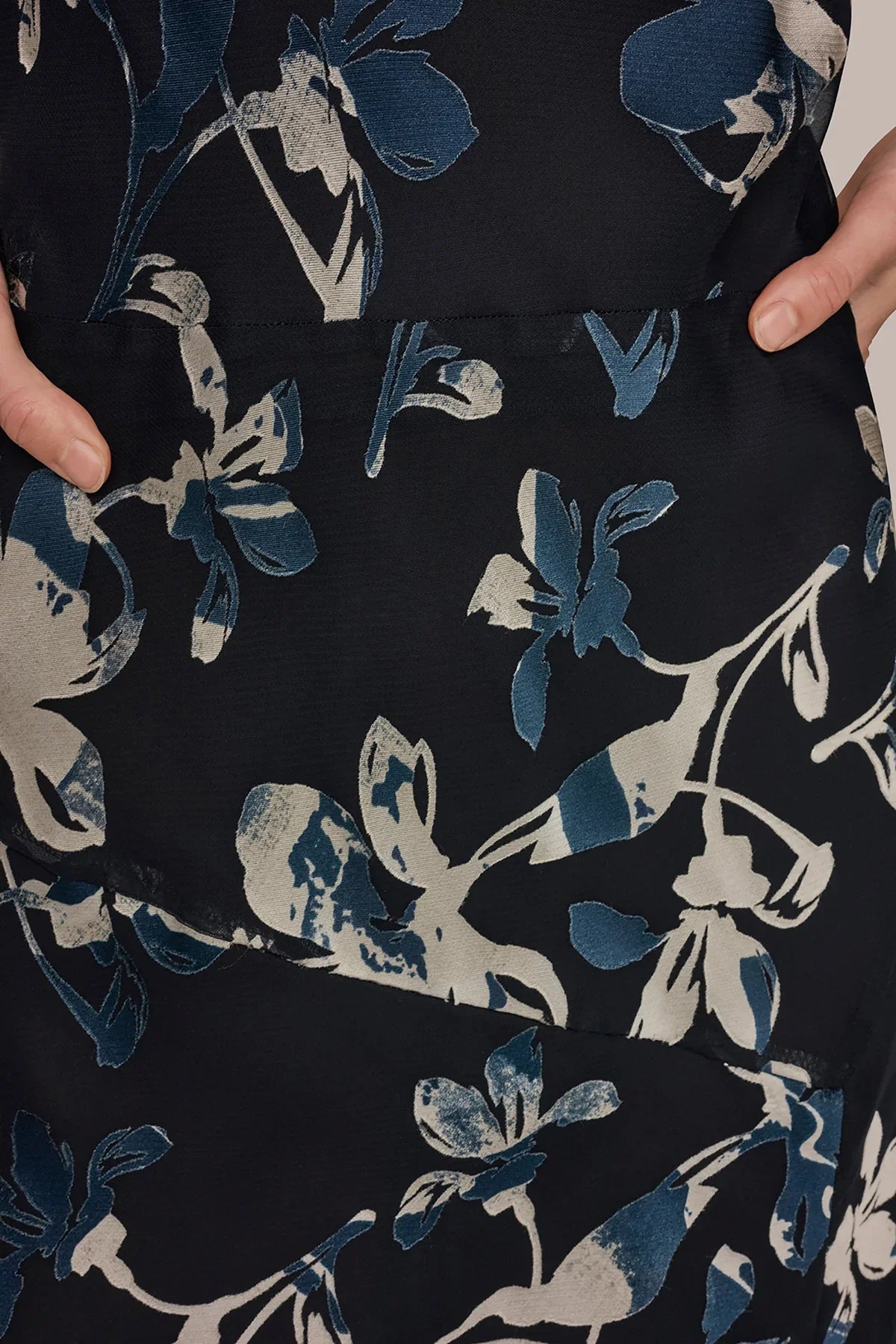 Dark navy burnout floral fabric with blue and cream flower motifs