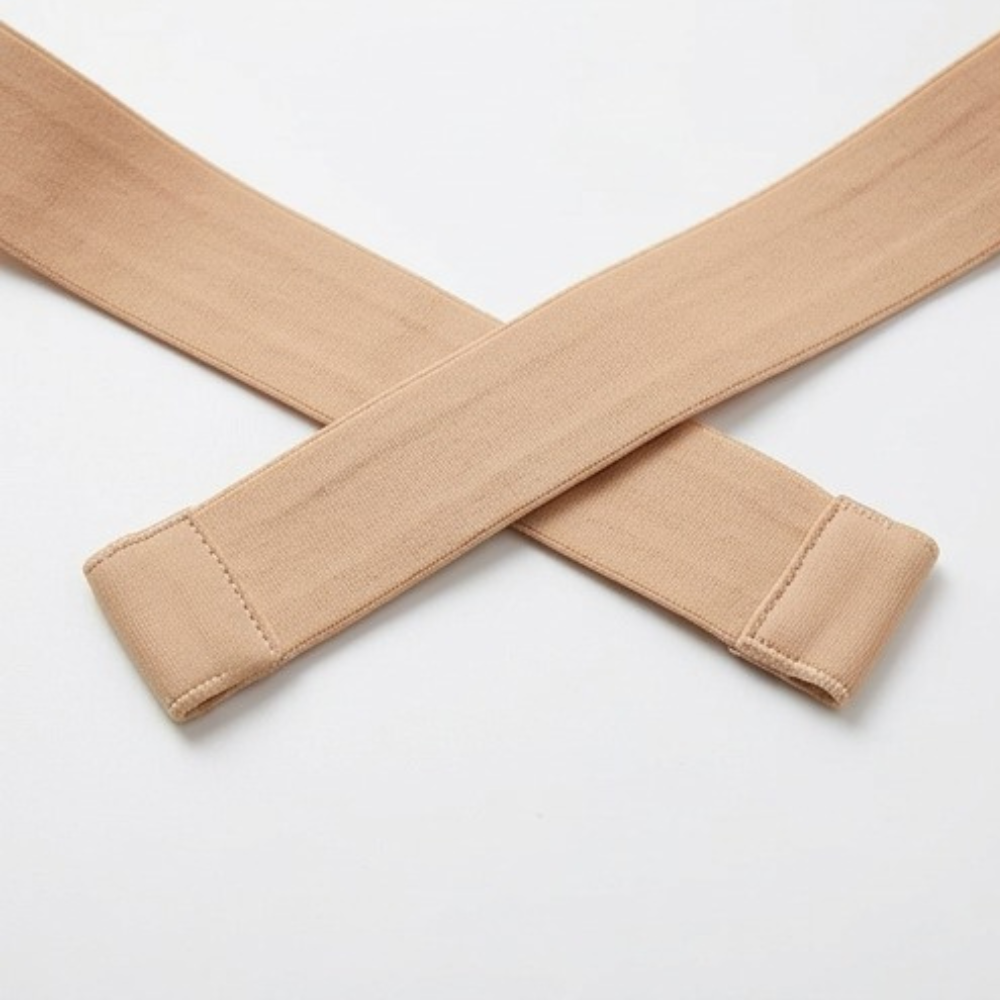 Crossover back bra straps shown crossed, with finished ends