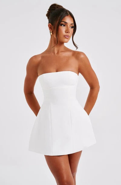 White strapless bubble mini dress with seamed bodice and flared skirt