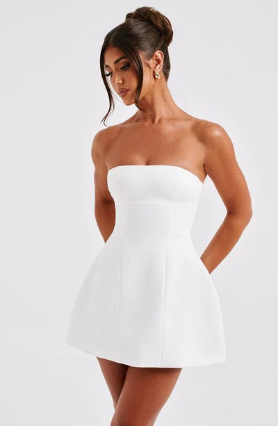 White strapless bubble mini dress with fitted seamed bodice and flared skirt