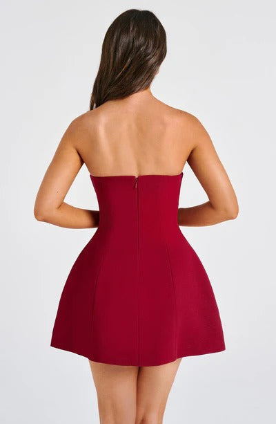 Wine red strapless bubble mini dress, back view with center seam and flared skirt