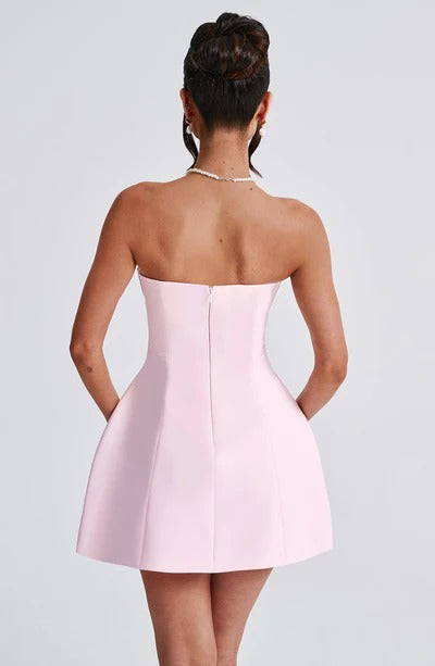 Light pink strapless bubble mini dress, back view with center seam and flared skirt