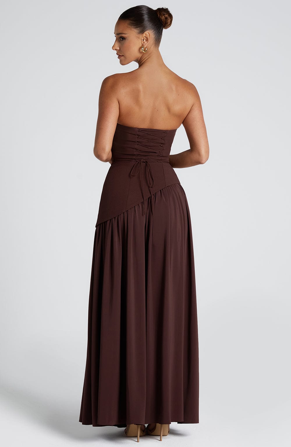 Burgundy strapless maxi dress with draped skirt and side slit