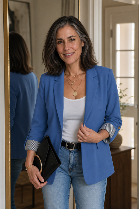 Blue tailored blazer with roll-sleeve striped cuffs and round gunmetal buttons