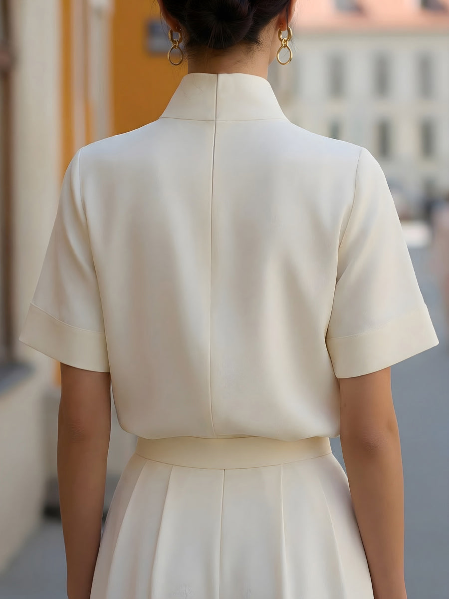 Structured stand collar blouse, short-sleeve, back view, off-white