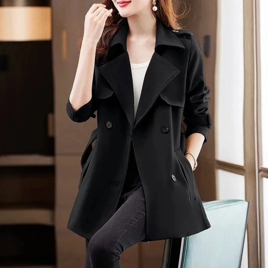 Black tailored trench coat with double-breasted front and wide lapels