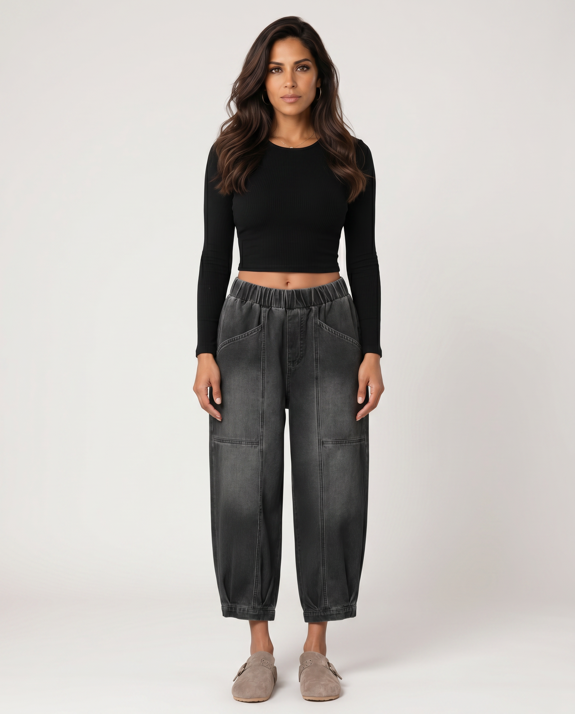 Denim jeans with elastic waistband, front patch pockets, and tapered straight legs
