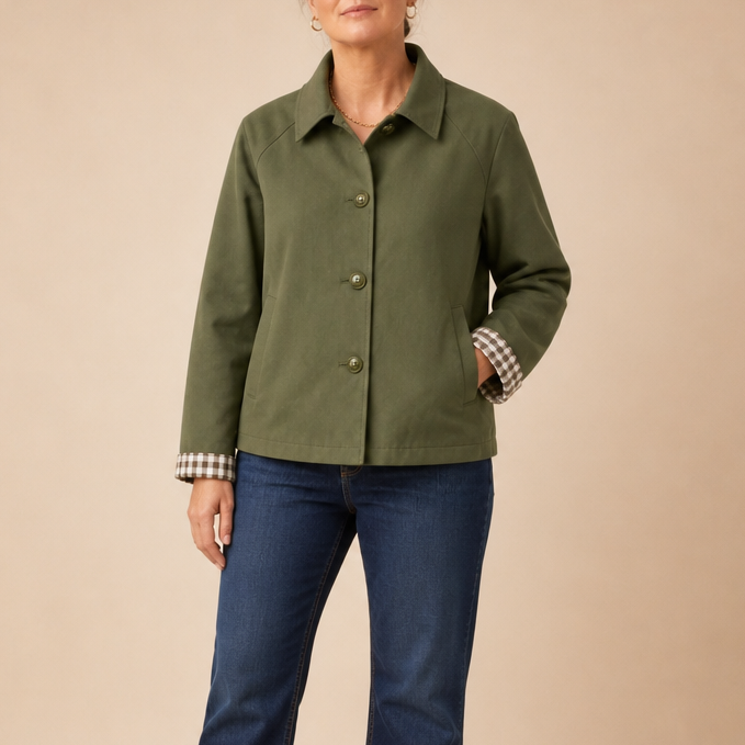 Army green raglan-sleeve casual coat with button front, collar, and plaid cuff accents