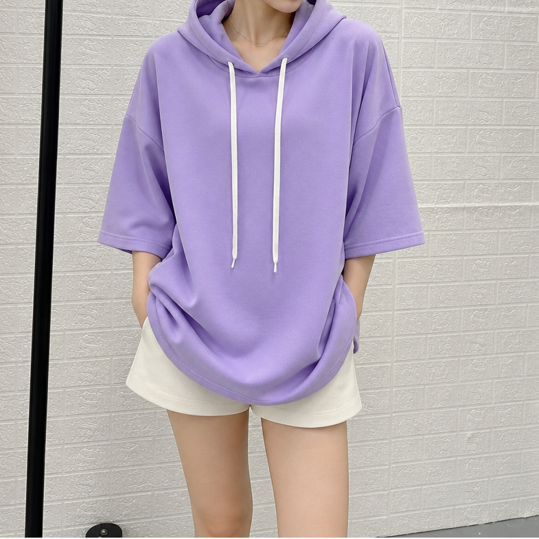 Lavender three-quarter sleeve hoodie with drawstring hood and white hanging strings